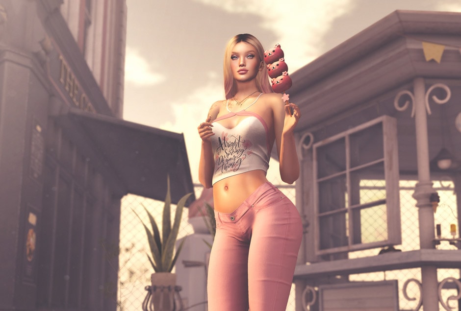 Girl in Pink Pants and white tank with a pink lollipop